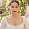 NIR-NEC-0010_Model_A Golden Floral Pendant Necklace